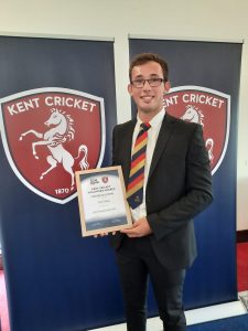 Tom Carey receiving his Kent Cricket Volunteer Award 2023 